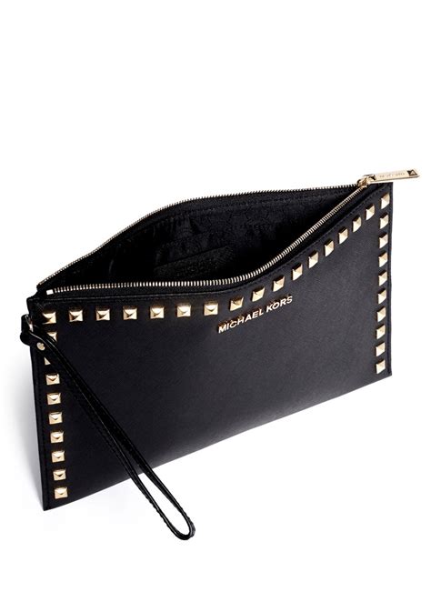 michael kors mercer clutch|Michael Kors studded clutch.